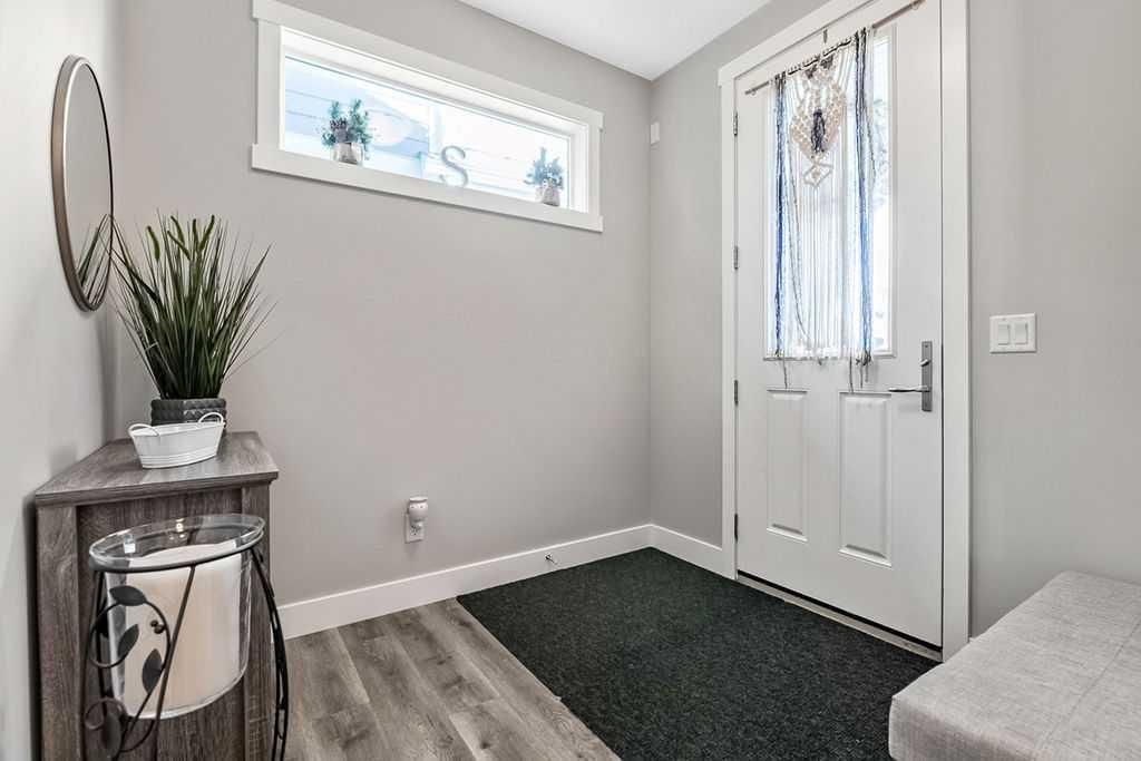 Photo of 75 Sundown Way, Cochrane, AB T4C 2M4 (MLS # A2306790)