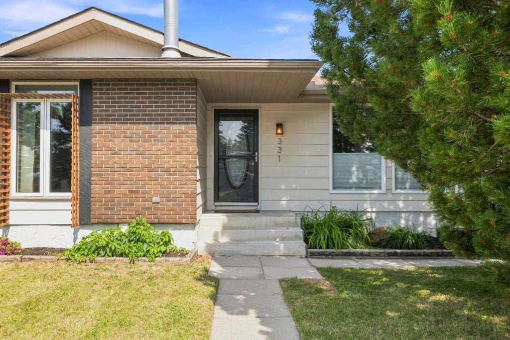 Photo of 331 Queensland Circle SE, Calgary, AB T2J 4E3 (MLS # A2323397)
