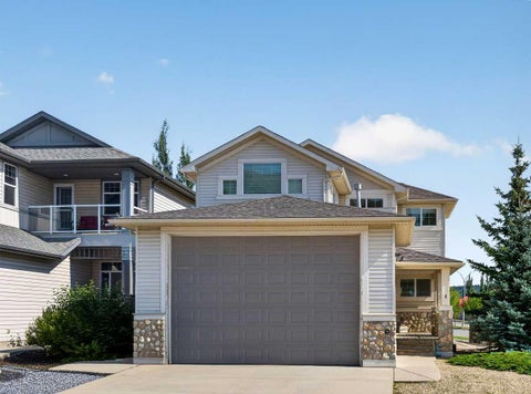 Photo of 4 Sunset Square, Cochrane, AB T4C 0H4 (MLS # A2341551)