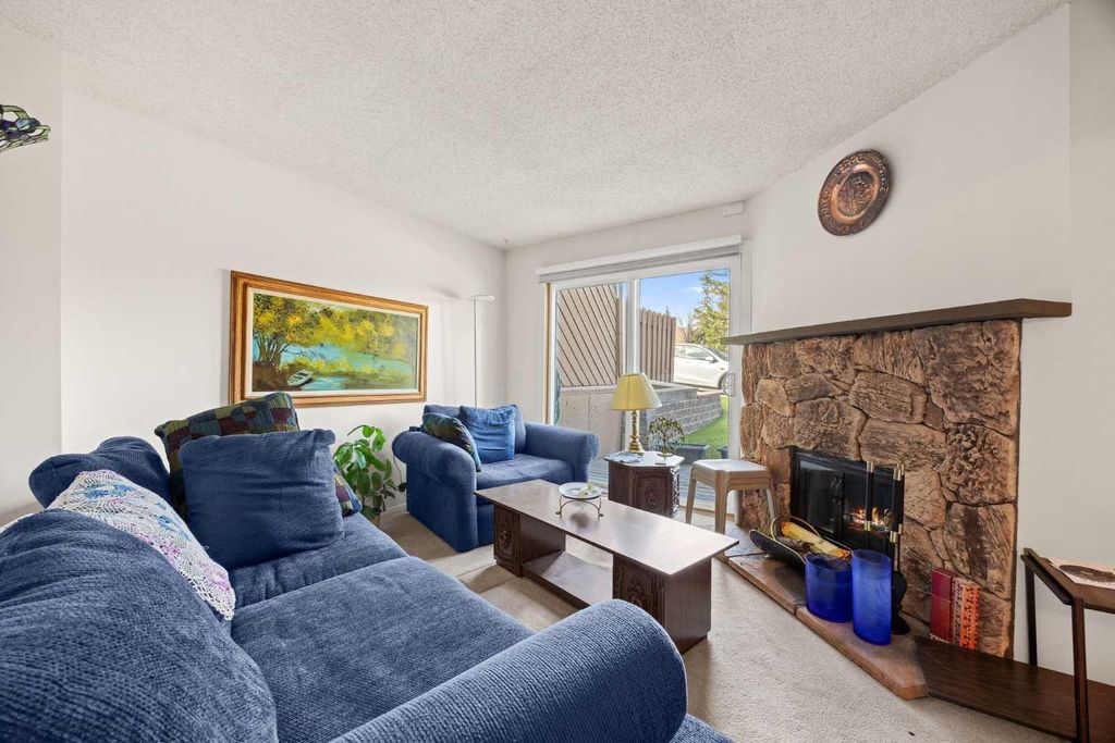 Photo of 4940 39 Avenue SW #8, Calgary, AB T3E 6M7 (MLS # A2310774)
