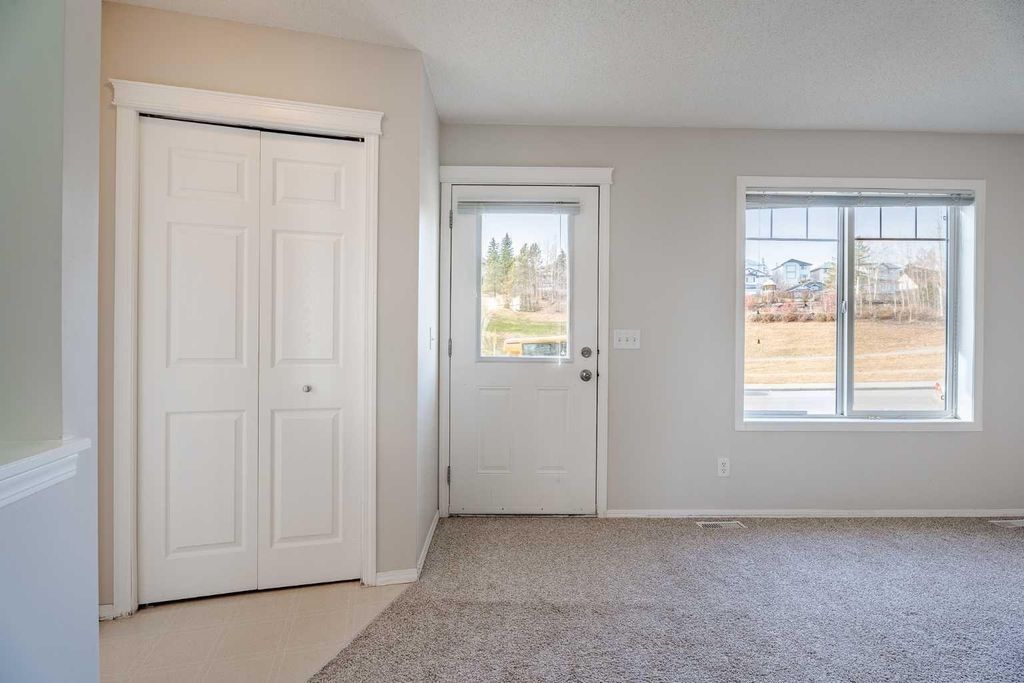 Photo of 122 Panamount Drive NW, Calgary, AB T3K 6K3 (MLS # A2296783)