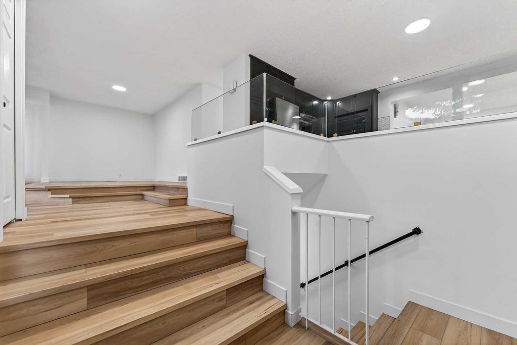 Photo of 1091 Berkley Drive NW, Calgary, AB T3K 1S6 (MLS # A2329717)