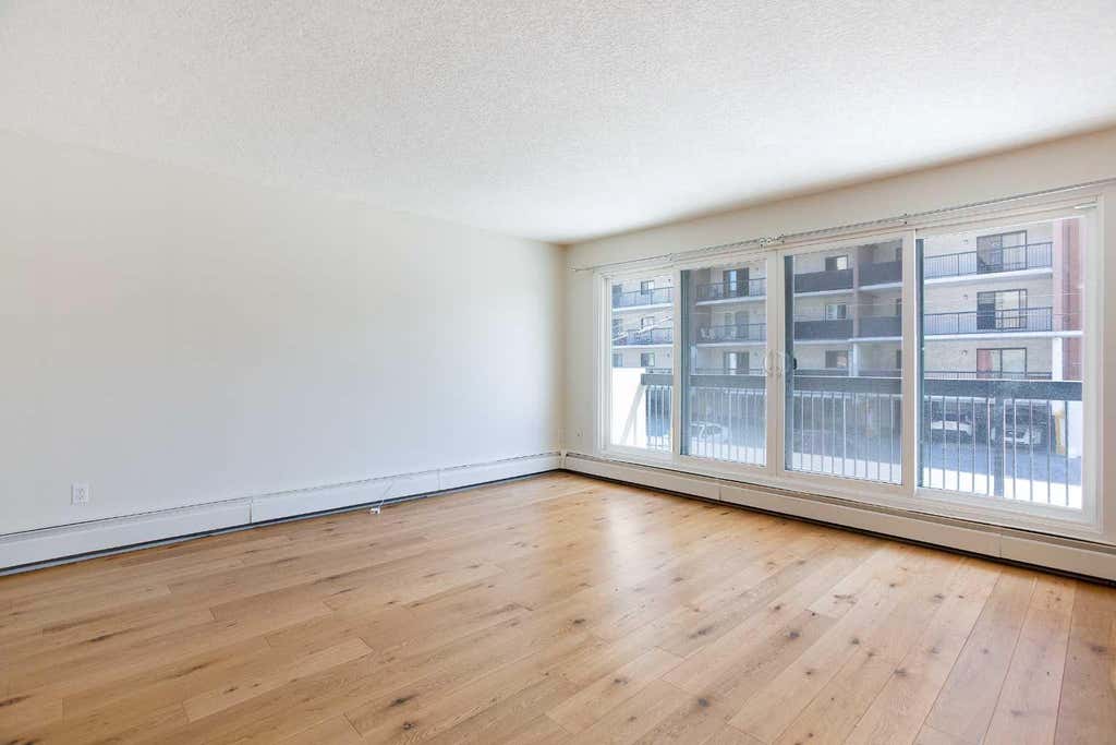 Photo of 1033 15 Avenue SW #204, Calgary, AB T2R 0S5 (MLS # A2312476)