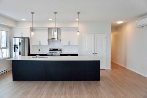 Photo of 80 Carrington Plaza NW #404, Calgary, AB T3P 1X6 (MLS # A2294208)