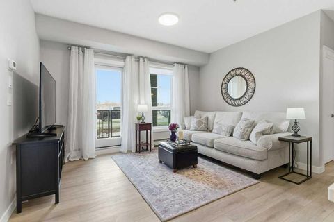 100 Banister Drive 1107 Okotoks AB T1S 5Y2