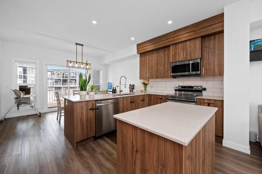Photo of 33 merganser Drive #203, Chestermere, AB T1X 2S3 (MLS # A2311736)