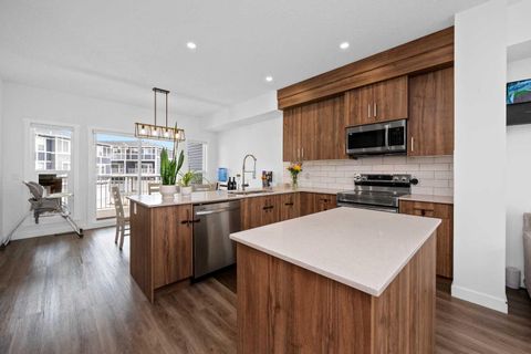 Photo of 33 merganser Drive #203, Chestermere, AB T1X 2S3 (MLS # A2311736)