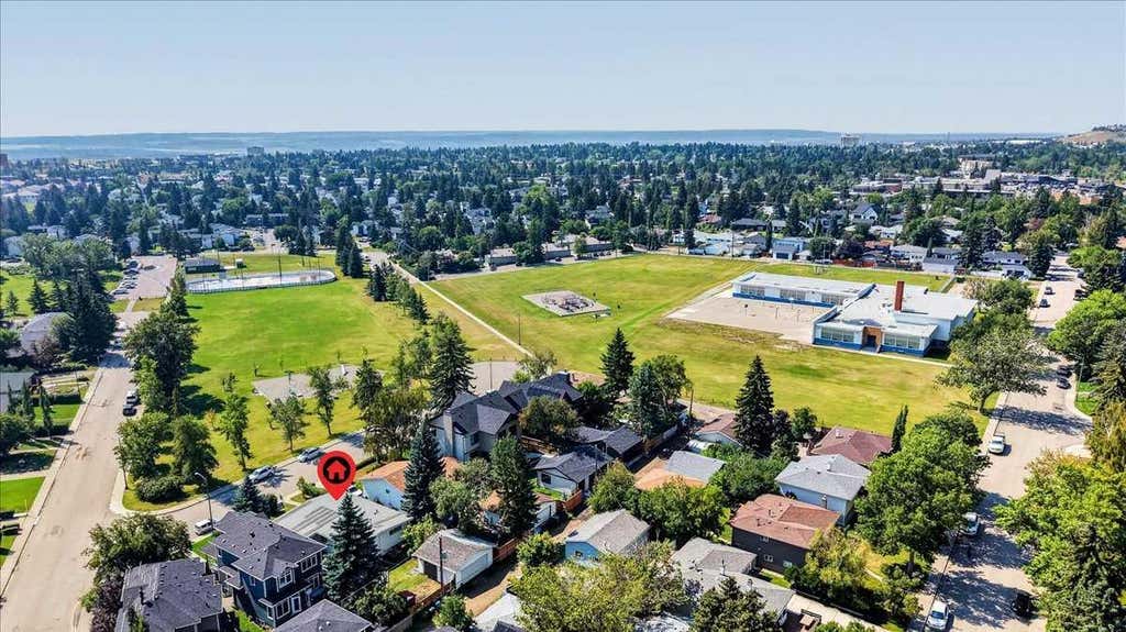 Photo of 3308 Rutland Road SW, Calgary, AB T3E 4R3 (MLS # A2338614)