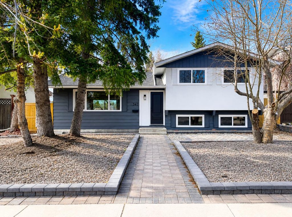 Photo of 347 Queensland Drive SE, Calgary, AB T2J 3R6 (MLS # A2311865)