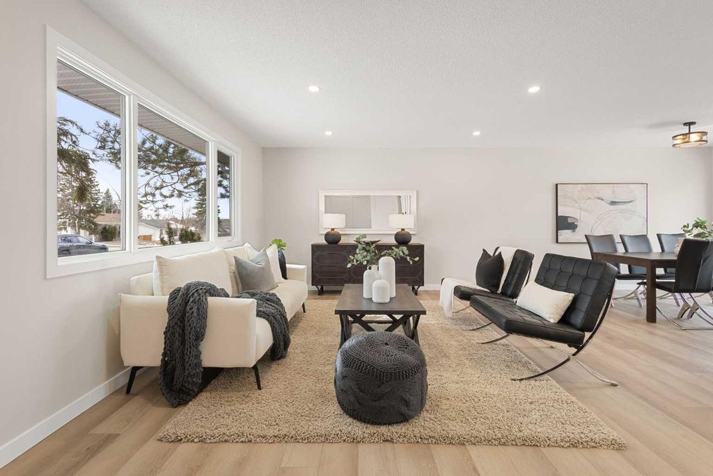 Photo of 347 Queensland Drive SE, Calgary, AB T2J 3R6 (MLS # A2311865)