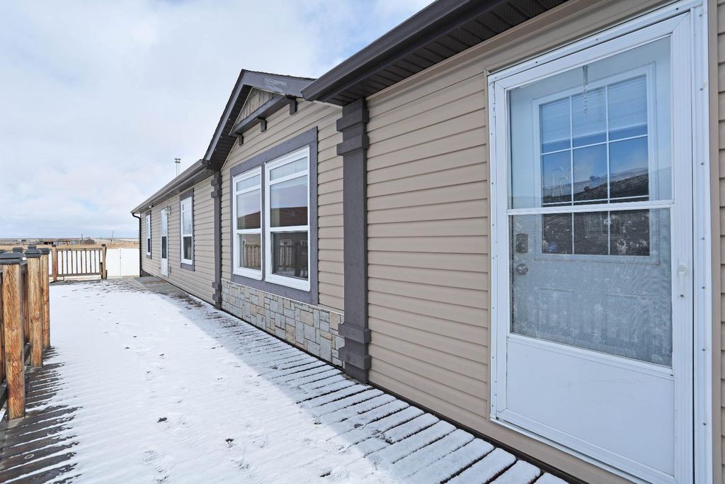 Photo of 145 Meadowplace Drive Dr E, Brooks, AB T1R 0X1 (MLS # A2292124)