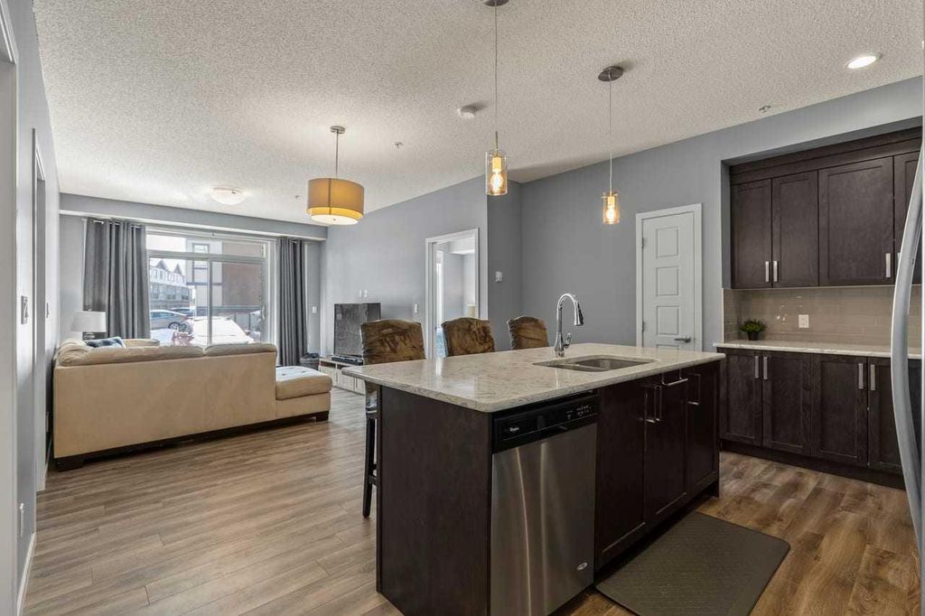 Photo of 6703 New Brighton Avenue SE #114, Calgary, AB T2Z 5C8 (MLS # A2295263)