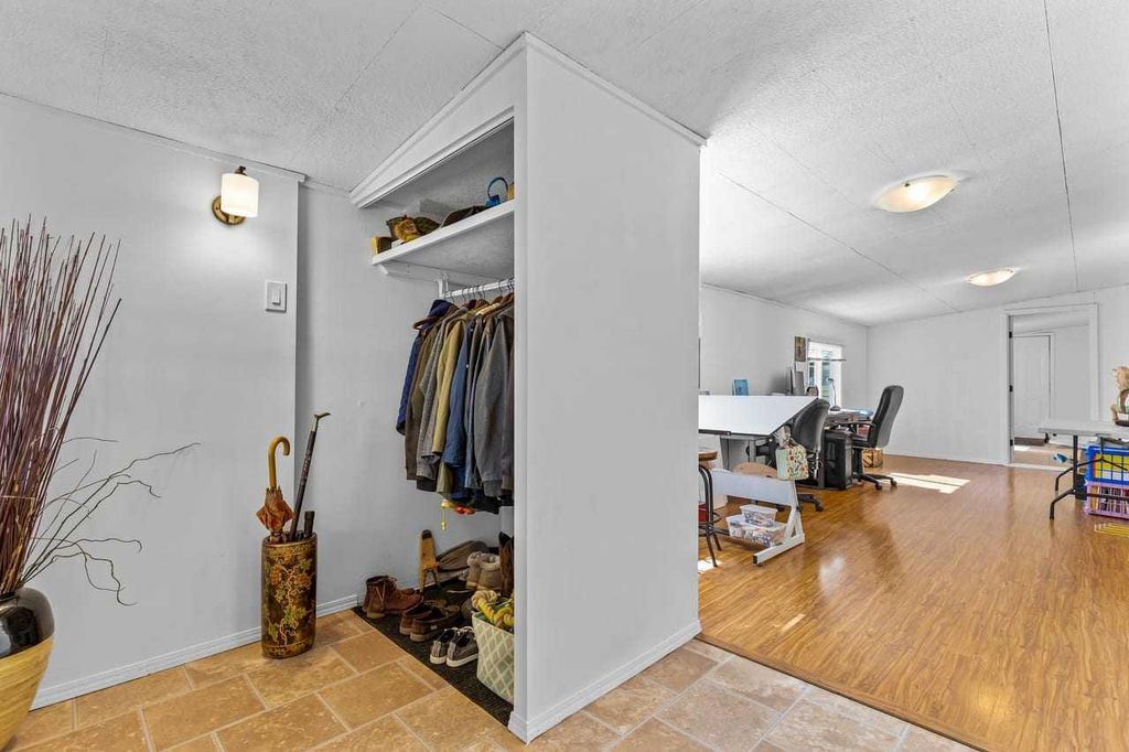 Photo of 117 Sunset Way, High River, AB T1V 1J4 (MLS # A2313307)
