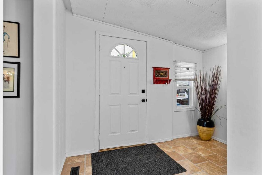Photo of 117 Sunset Way, High River, AB T1V 1J4 (MLS # A2313307)
