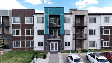 Photo of 8 Sage Hill Terrace NW #108, Calgary, AB T3R 0W5 (MLS # A2335745)