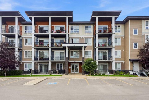 Photo of 30 Walgrove Walk SE #202, Calgary, AB T2X 4M9 (MLS # A2338490)