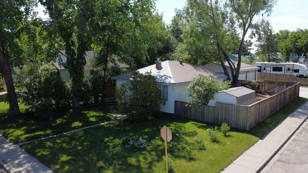 Photo of 31 Spruce Avenue W, Brooks, AB T1R 0A2 (MLS # A2321157)