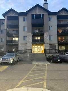Photo of 304 Mackenzie Way SW #8412, Airdrie, AB T4B 3H7 (MLS # A2349707)