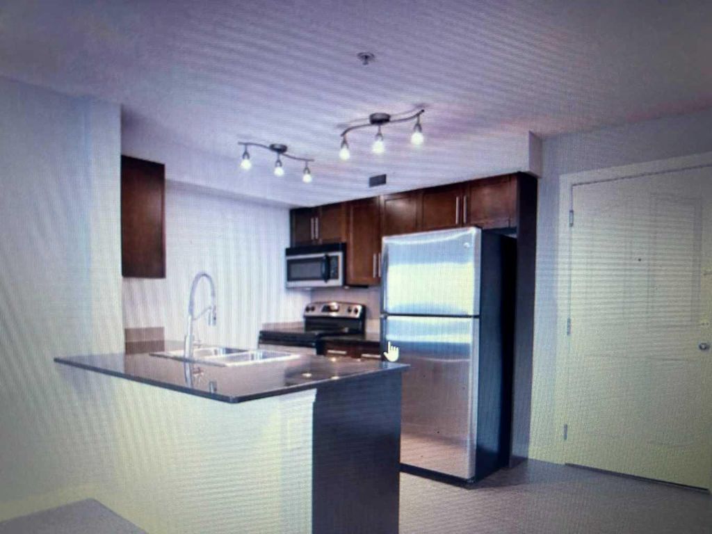 Photo of 7110 80 Avenue NE #320, Calgary, AB T3J 0N4 (MLS # A2323024)