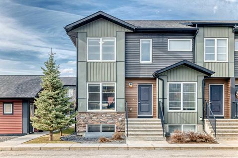 Photo of 31 Red Embers Parade NE #128, Calgary, AB T3N 1E9 (MLS # A2304067)