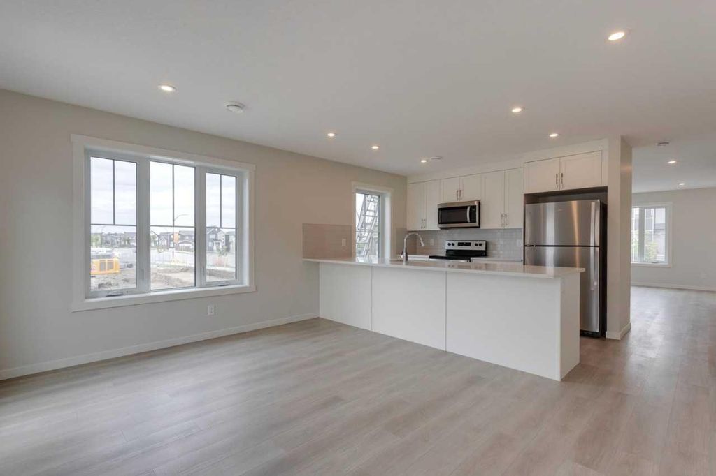 Photo of 40 Livingston Parade NE #202, Calgary, AB T4B 3P6 (MLS # A2313427)