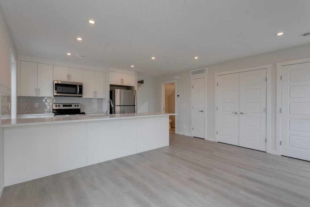 Photo of 40 Livingston Parade NE #202, Calgary, AB T4B 3P6 (MLS # A2313427)