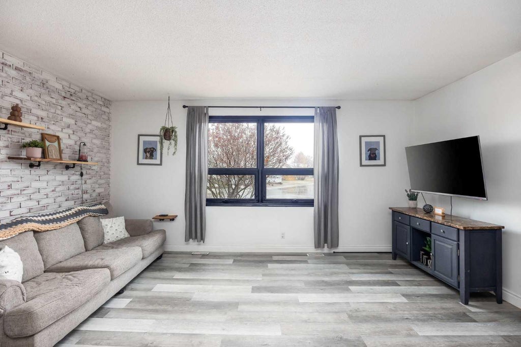 Photo of 203 Cochrane Crescent, Fort McMurray, AB T9K 1H1 (MLS # A2354619)