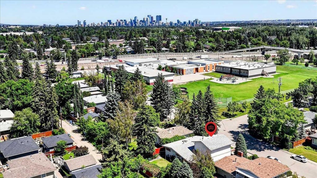 Photo of 6403 Larkspur Way SW, Calgary, AB T3E 5P9 (MLS # A2328161)