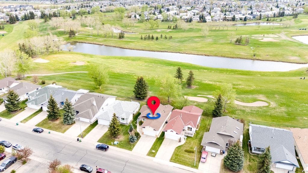 Photo of 512 Woodside Drive NW, Airdrie, AB T4B 2C6 (MLS # A2308172)