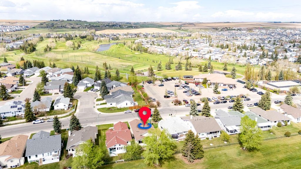 Photo of 512 Woodside Drive NW, Airdrie, AB T4B 2C6 (MLS # A2308172)