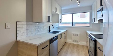 Photo of 2400 15 Street SW #29, Calgary, AB T2T 5S3 (MLS # A2313788)