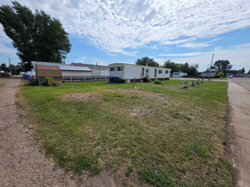 Photo of 5403 41 Avenue, Taber, AB T1G 1C1 (MLS # A2330321)