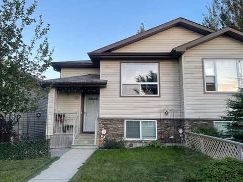 Photo of 766 Mt Sundance Lane W, Lethbridge, AB T1J 0T3 (MLS # A2326600)