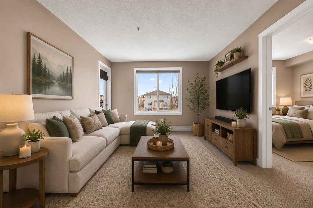 Photo of 403 Mackenzie Way SW #4317, Airdrie, AB T4B 3V7 (MLS # A2324086)