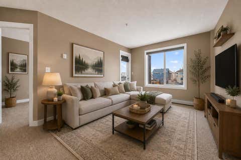 Photo of 403 Mackenzie Way SW #4317, Airdrie, AB T4B 3V7 (MLS # A2324086)