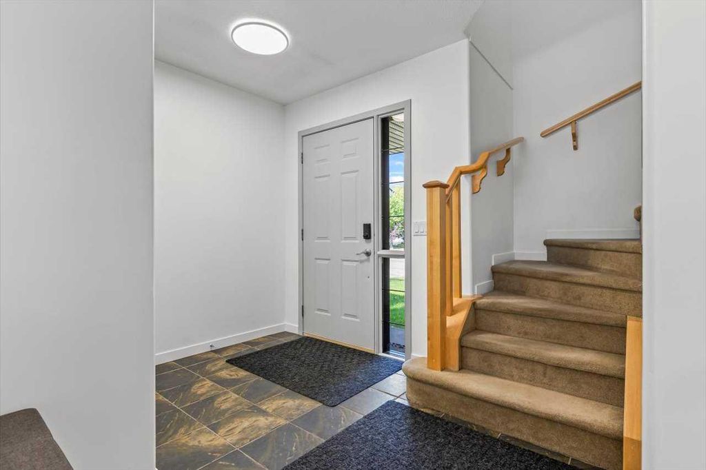 Photo of 57 Everwillow Boulevard SW, Calgary, AB T2Y 4G4 (MLS # A2297732)