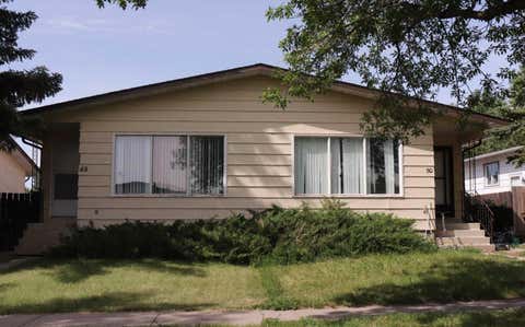 Photo of 48 and 50 Jerry Potts Boulevard W, Lethbridge, AB T1K 5M5 (MLS # A2324791)