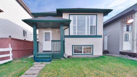 Photo of 215 Taravista Drive, Calgary, AB T3J 5A5 (MLS # A2262332) Photo of 215 Taravista Drive, Calgary, AB T3J 5A5 (MLS # A2262332)