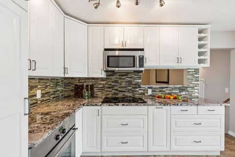 Photo of 931 124 Avenue SW, Calgary, AB T2W 1T2 (MLS # A2319782)