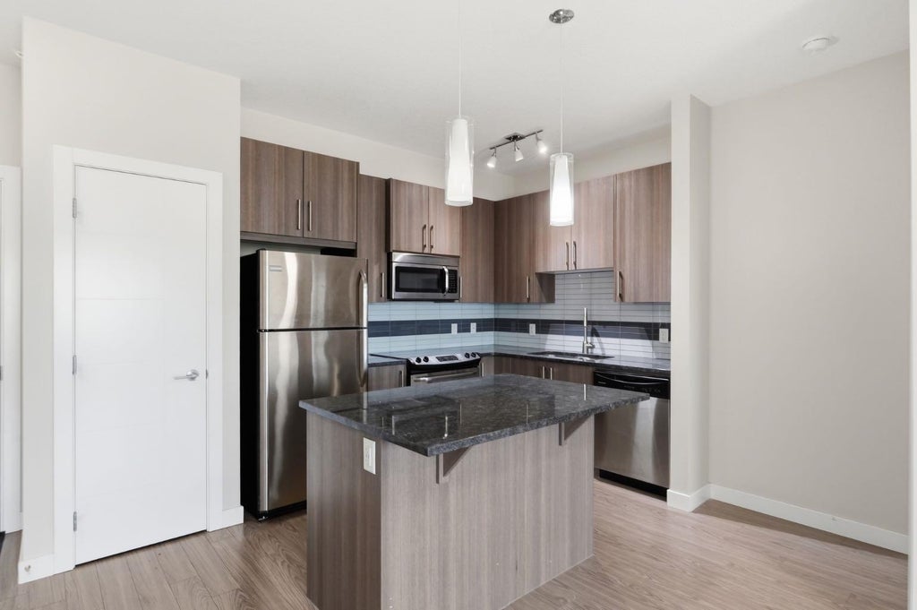 Photo of 4 Sage Hill Terrace NW #306, Calgary, AB T3R 0W4 (MLS # A2339921)