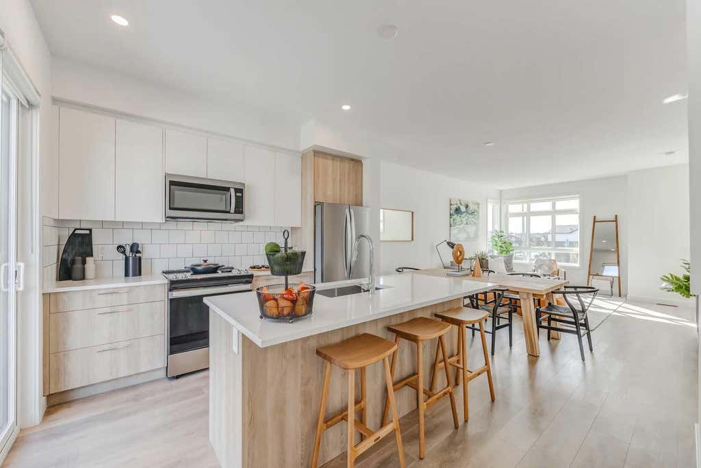 Photo of 839 Belmont Drive SW, Calgary, AB T2X 4P2 (MLS # A2336264)