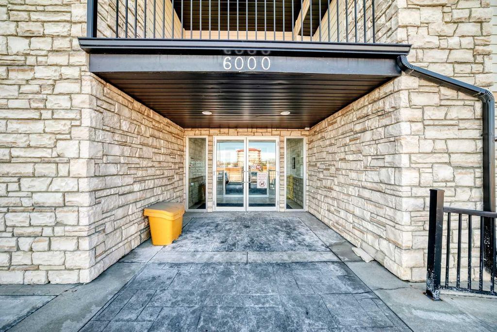 Photo of 304 Mackenzie Way SW #6310, Airdrie, AB T4B 3H6 (MLS # A2294862)