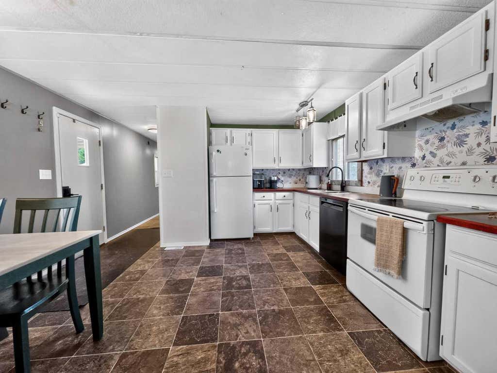 Photo of 10617 102 Avenue, La Crete, AB T0H 2H0 (MLS # A2338488)
