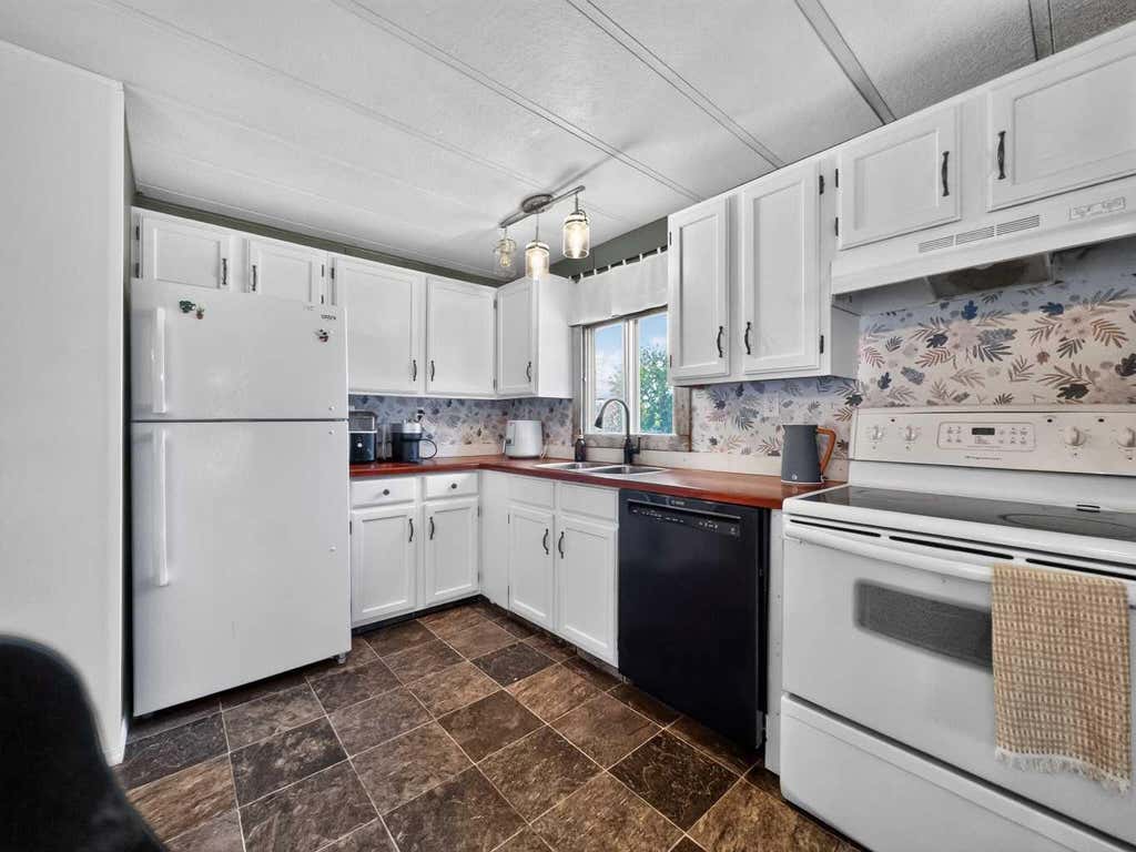 Photo of 10617 102 Avenue, La Crete, AB T0H 2H0 (MLS # A2338488)