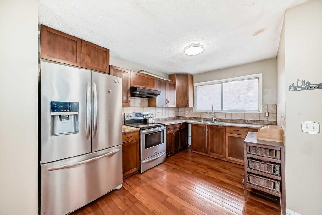 Photo of 660 Malvern Drive NE, Calgary, AB T2A 5P5 (MLS # A2320497)