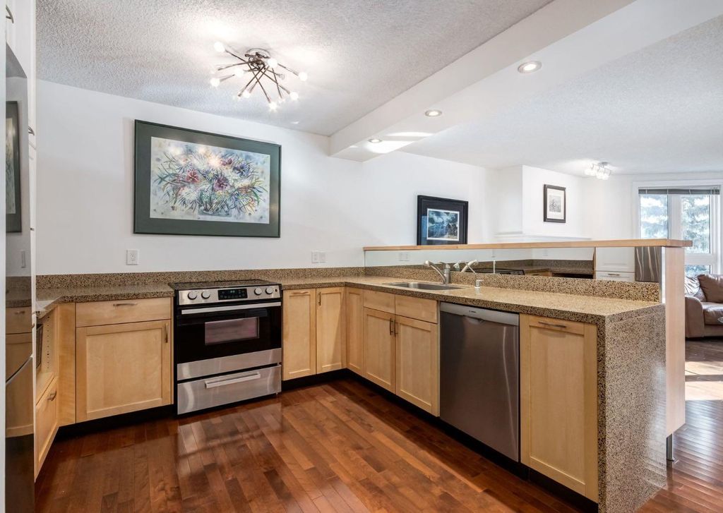 Photo of 400 Eau Claire Avenue SW #8402, Calgary, AB T2P 4X2 (MLS # A2294807)