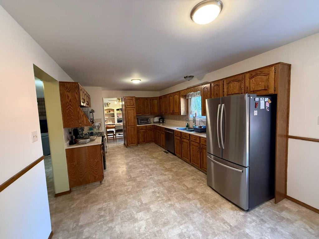 Photo of 114 Red crow Boulevard W, Lethbridge, AB T1K 5M1 (MLS # A2344987)