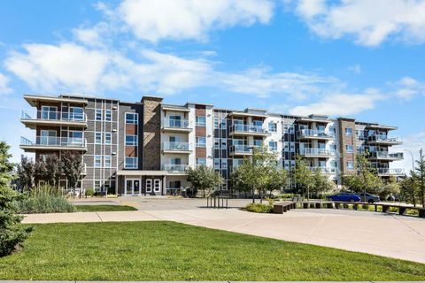 Photo of 360 Harvest Hills Common NE #107, Calgary, AB T3K 2N1 (MLS # A2327112)