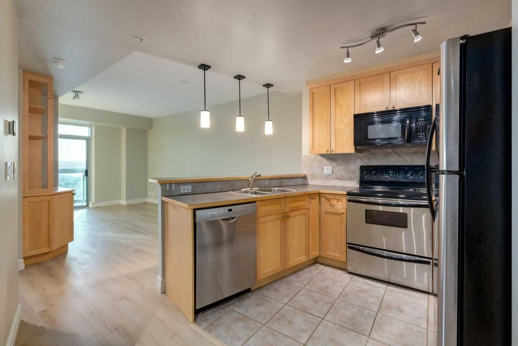 Photo of 836 15 Avenue SW #2104, Calgary, AB T2R 1S2 (MLS # A2316387)