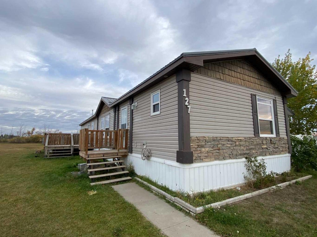 Photo of 127 Meadowplace Drive E, Brooks, AB T1R 0X1 (MLS # A2351216)